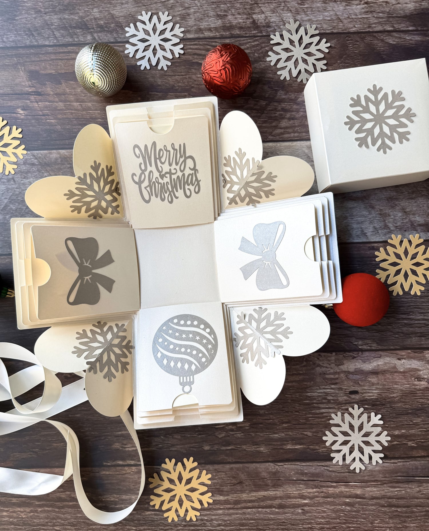 Top-view hero image of the explosion gift box with closed lid.