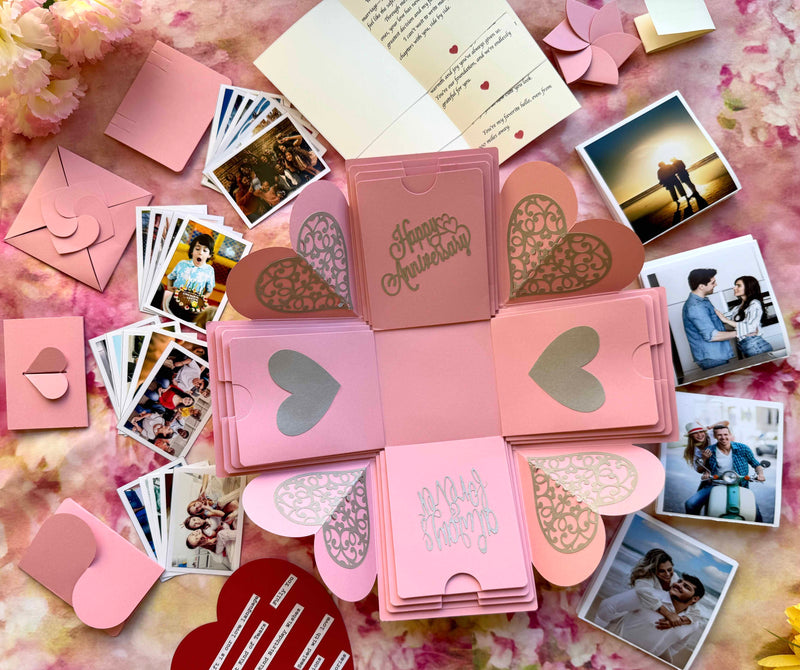 Pink Anniversary Explosion Gift Box – Mega Surprise edition with multiple photo pull-out albums, hidden message layers, and a romantic pink design perfect for celebrating love.