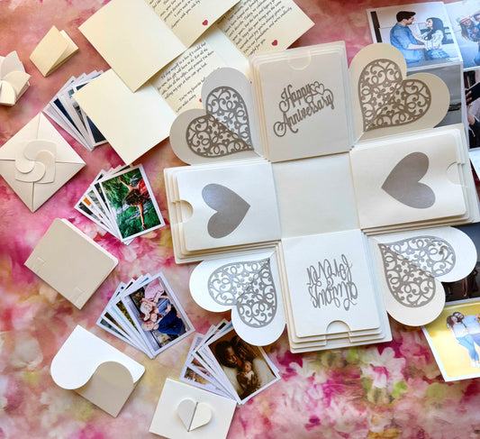 Top view of white explosion gift box before opening, anniversary presentation