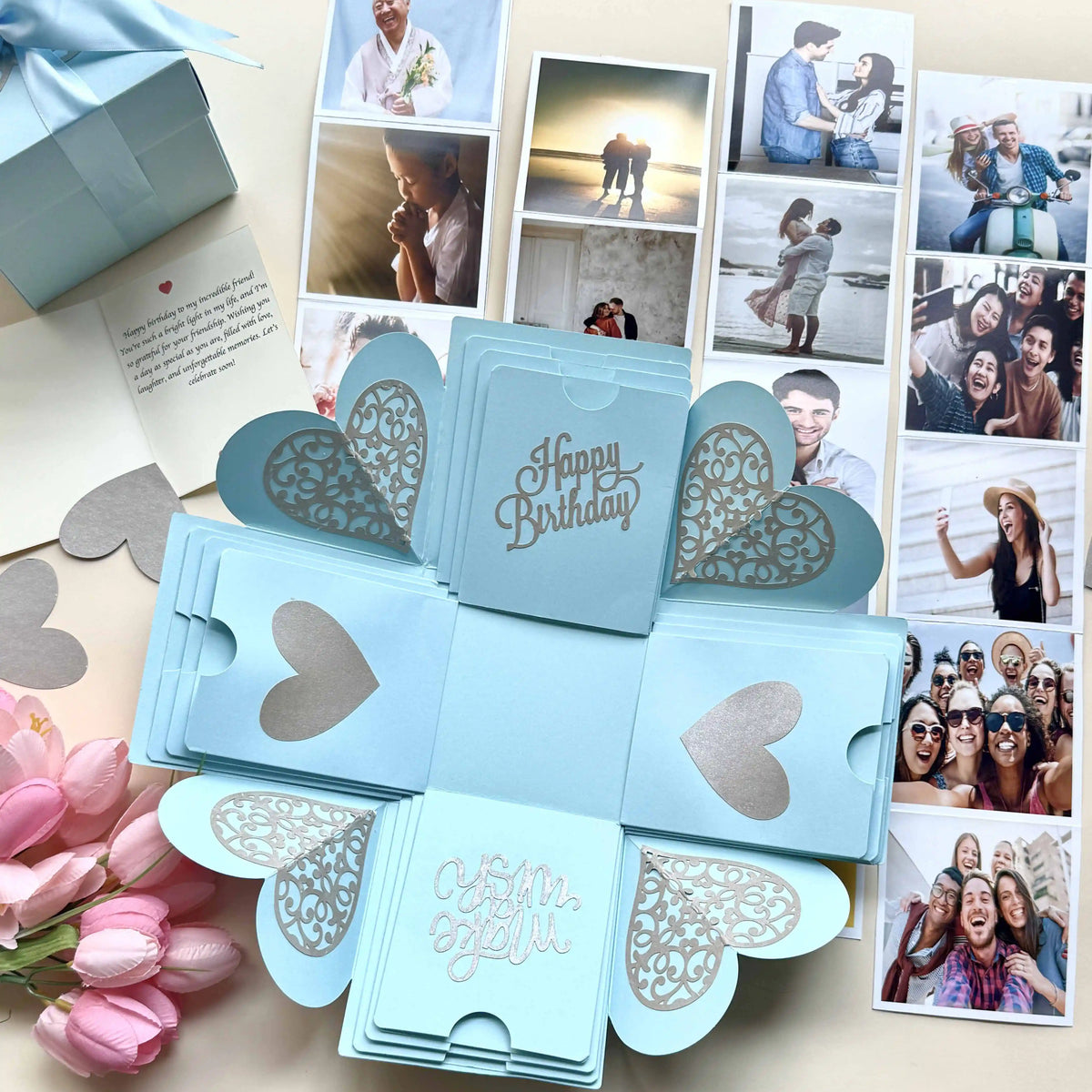 Close-up detail of blue birthday explosion gift box with photos and messages