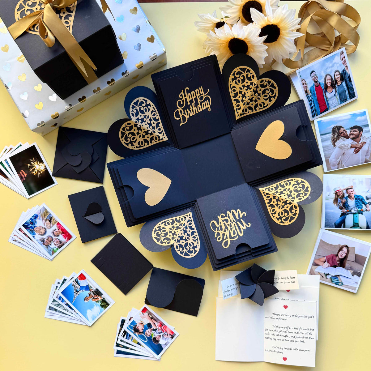 Black and Gold Birthday Explosion Gift Box – Mega Surprise edition with multiple photo pull-out albums, secret message layers, and elegant gold accents for a luxurious birthday reveal.