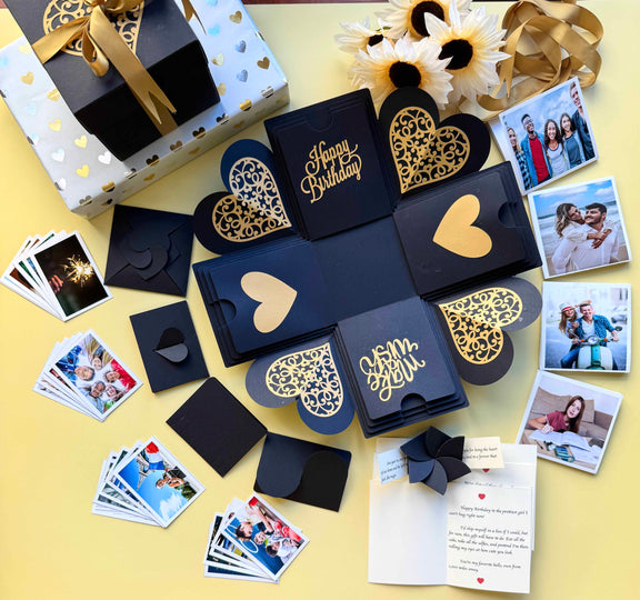 Black and Gold Birthday Explosion Gift Box – Mega Surprise edition with multiple photo pull-out albums, secret message layers, and elegant gold accents for a luxurious birthday reveal.
