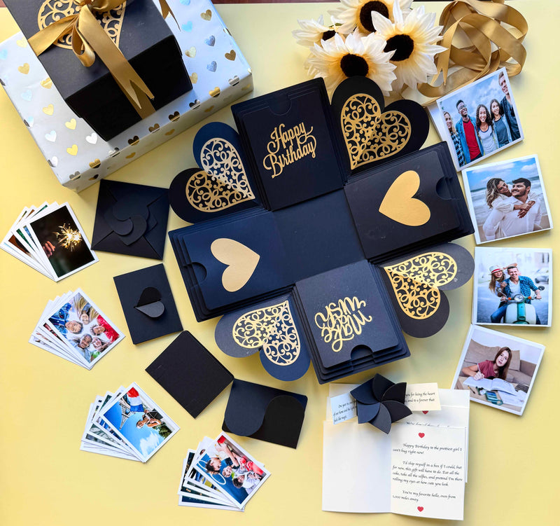 Black and Gold Birthday Explosion Gift Box – Mega Surprise edition with multiple photo pull-out albums, secret message layers, and elegant gold accents for a luxurious birthday reveal.