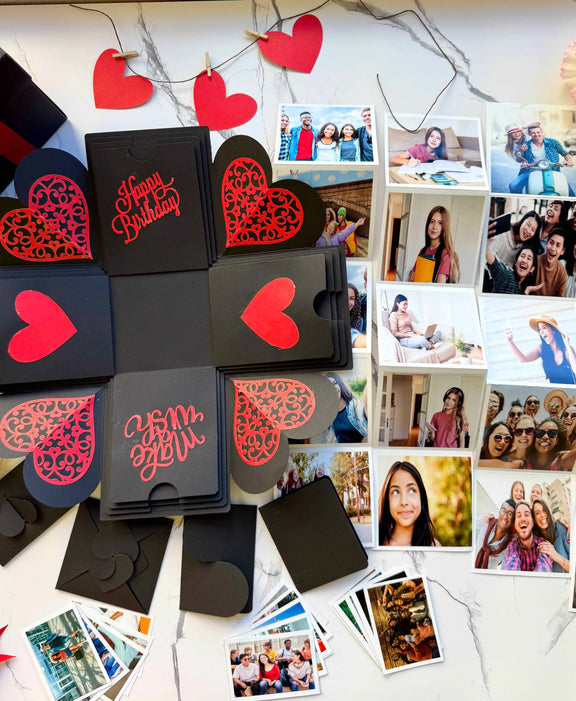 Black and Red birthday explosion gift box opened flat, showing photos and message cards