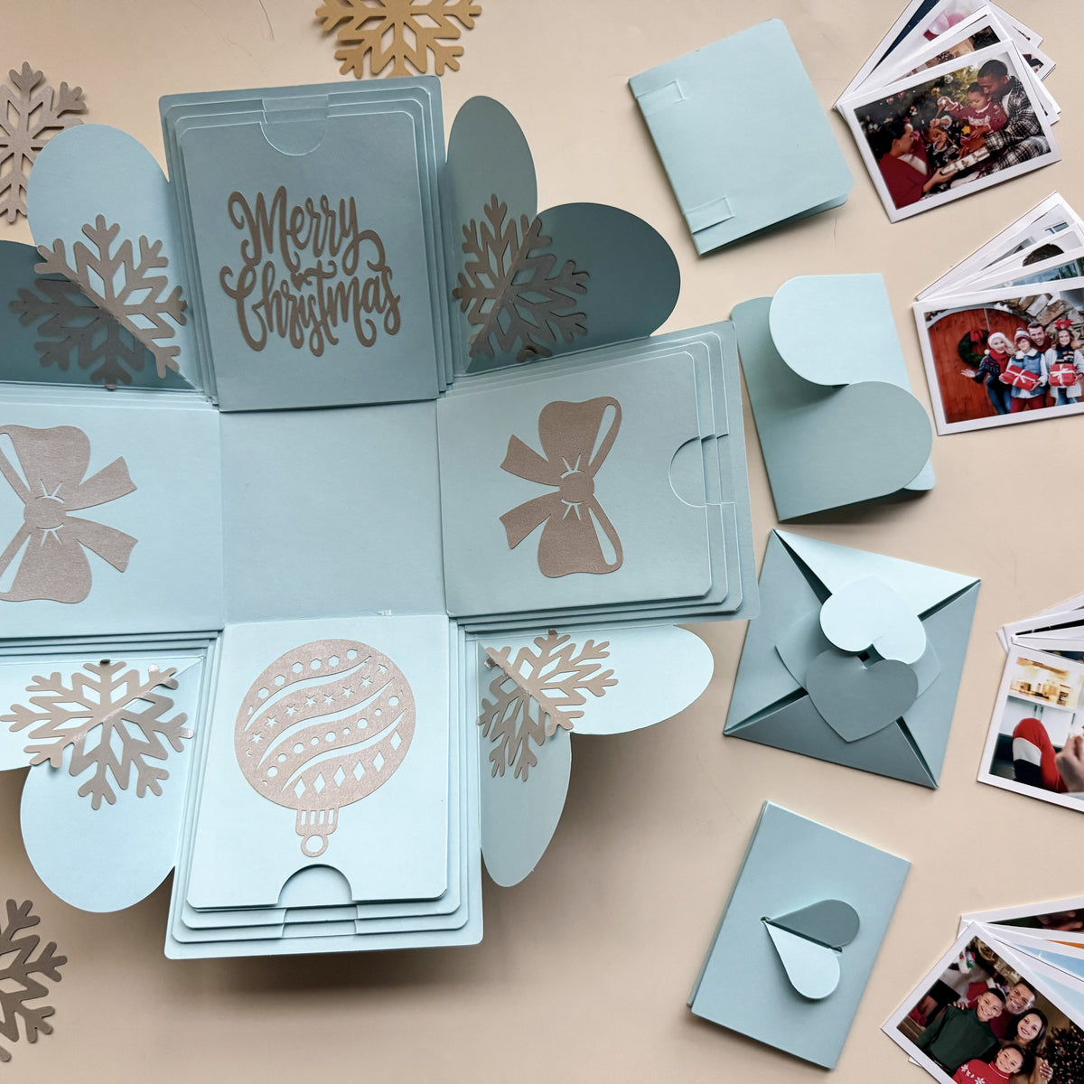 Angled shot of blue Christmas explosion gift box in the mini surprise version.