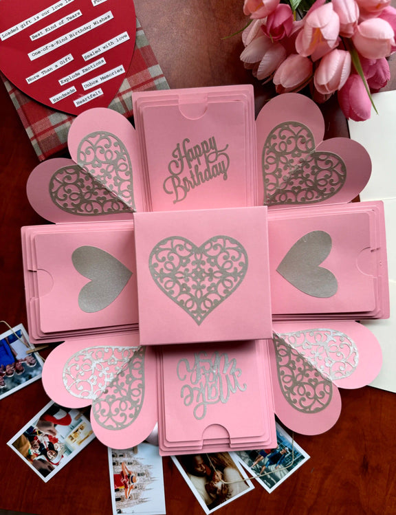 Top view of pink birthday explosion gift box before opening