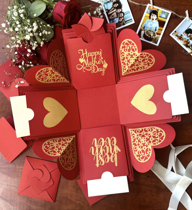 Red Mother's Day explosion box with photo strings - Close-up shot
