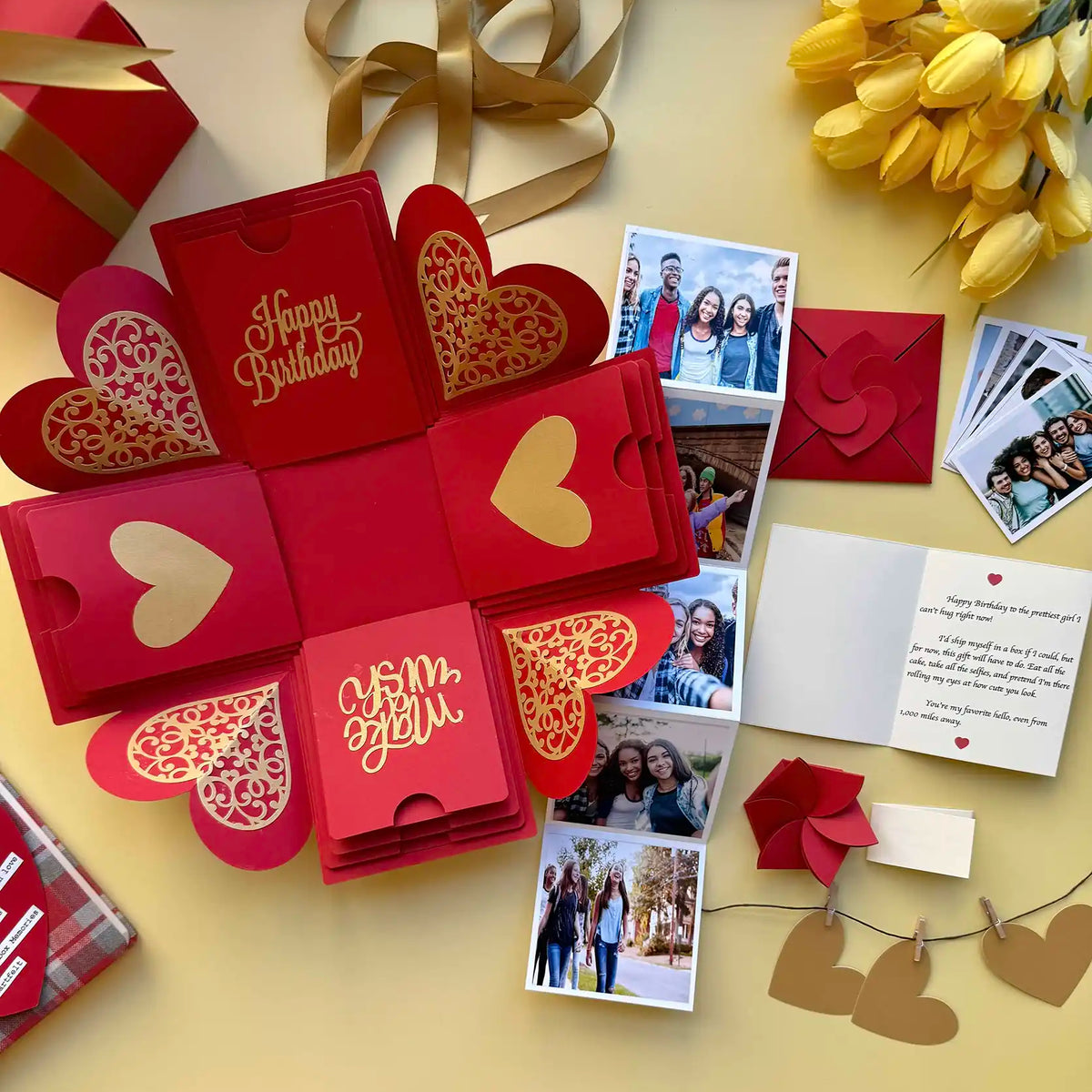 Red birthday explosion gift box unopened, angled shot with ribboned lid