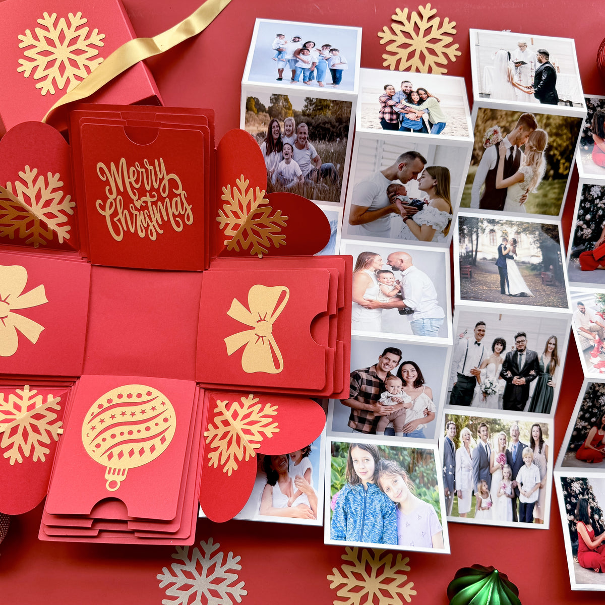 Red Christmas explosion gift box with personalized photos and holiday messages.