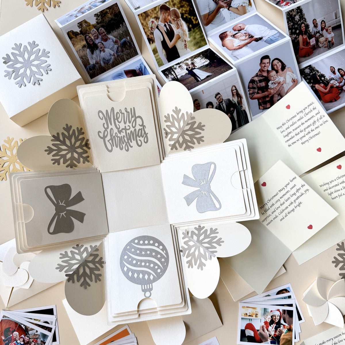 Close-up of explosion gift box with origami photo pockets unfolded.
