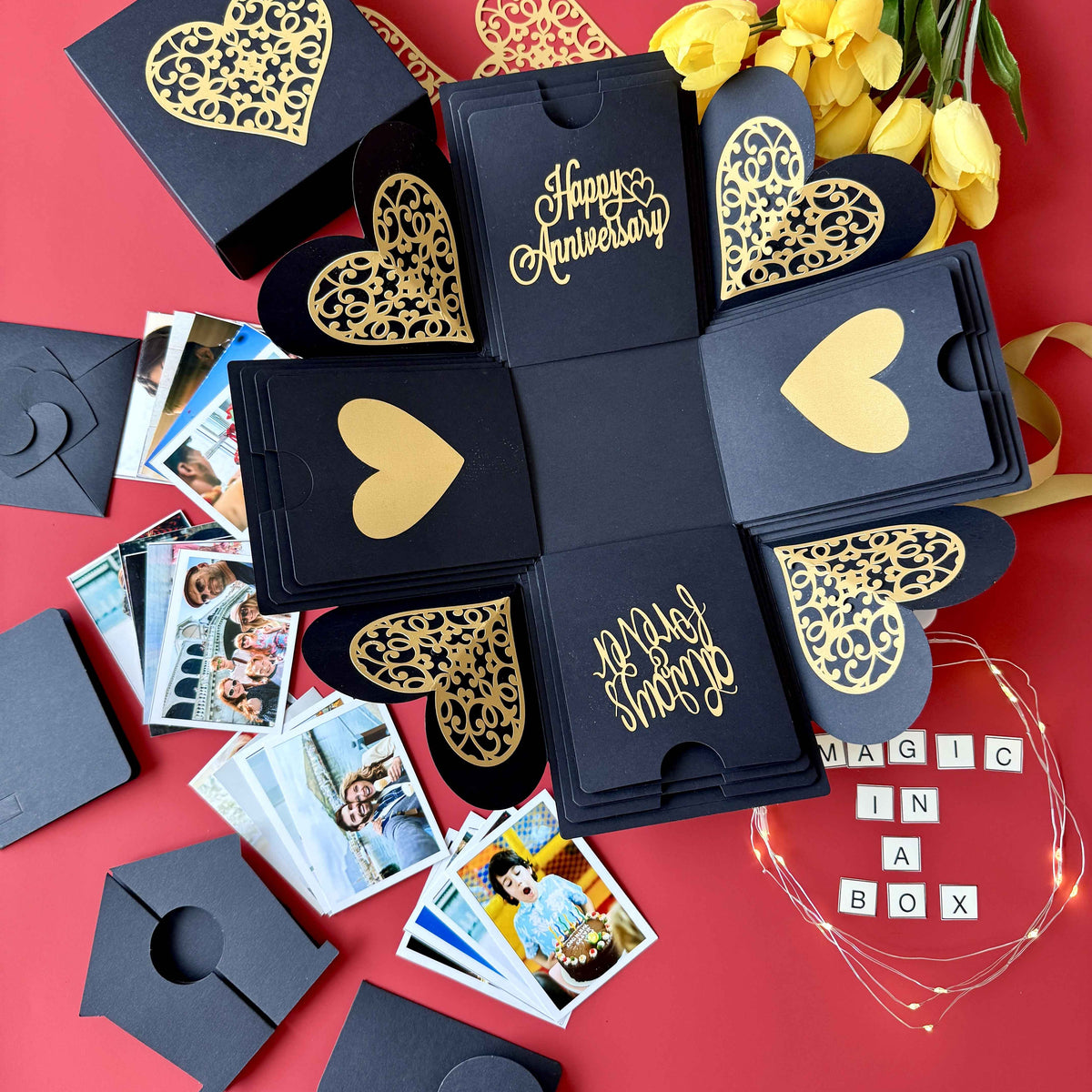 Close-up of message layer inside black and gold explosion gift box with personalized anniversary note